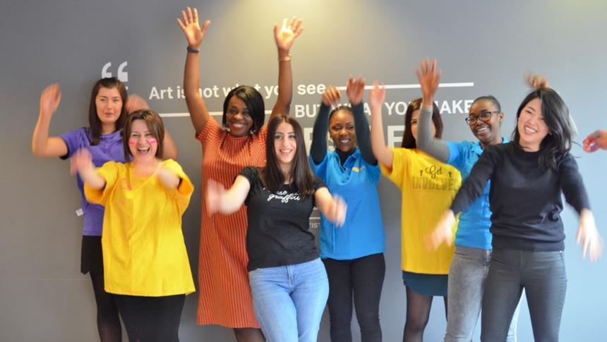 a group of girls cheering