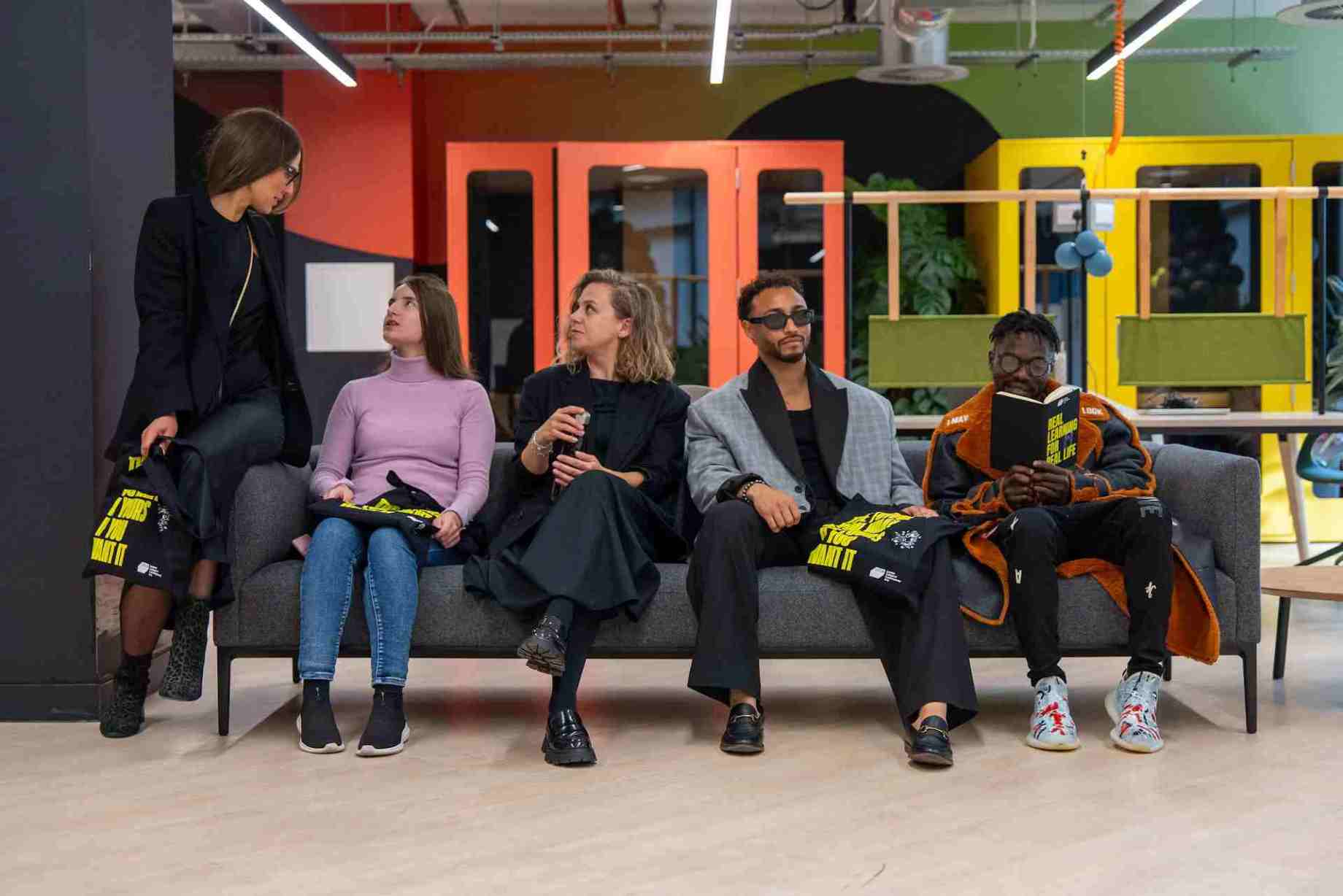 people sitting on a sofa