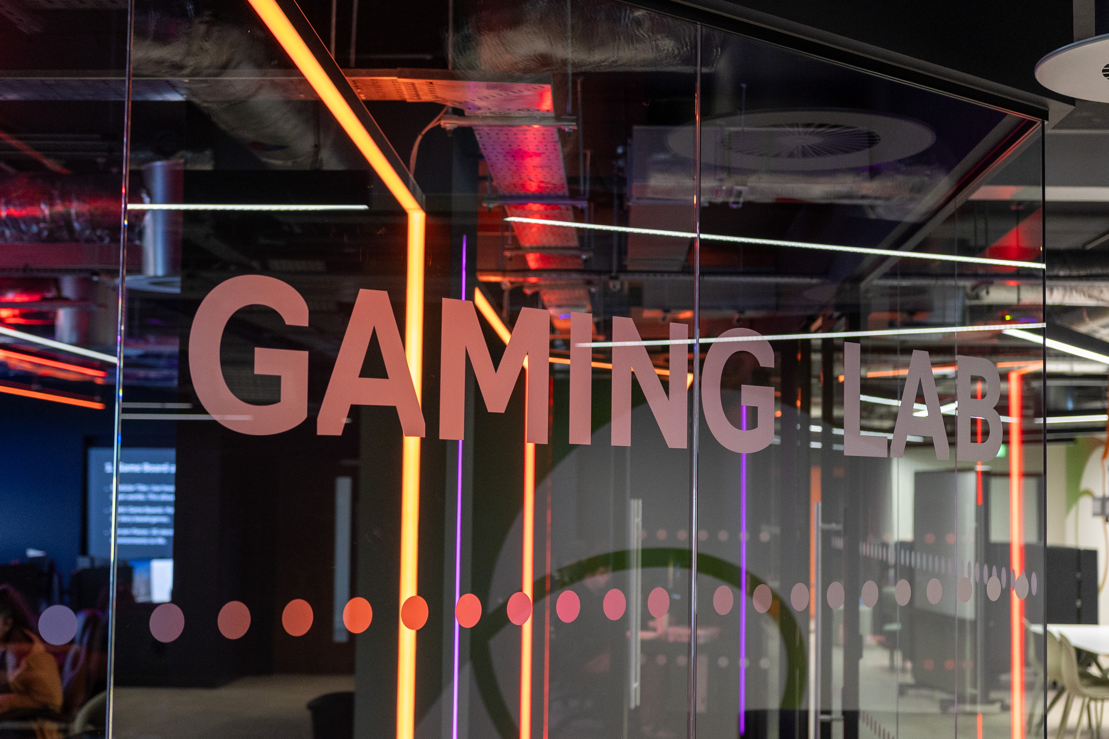 Computer Gaming Lab room with frosted lettering and colourful lighting