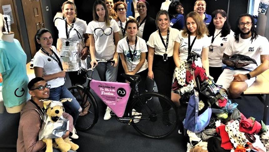 A group of LCCA students smiling at an event