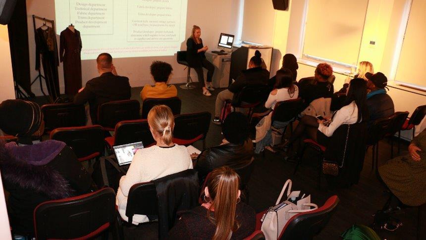 people in a class with a person presenting