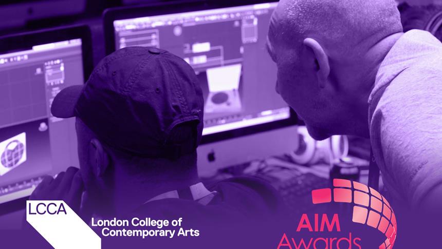 2 people looking at a computer screen