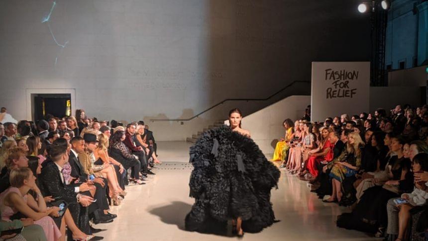 A model walking down the ramp at a fashion show