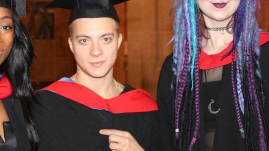 A person in their graduation gown
