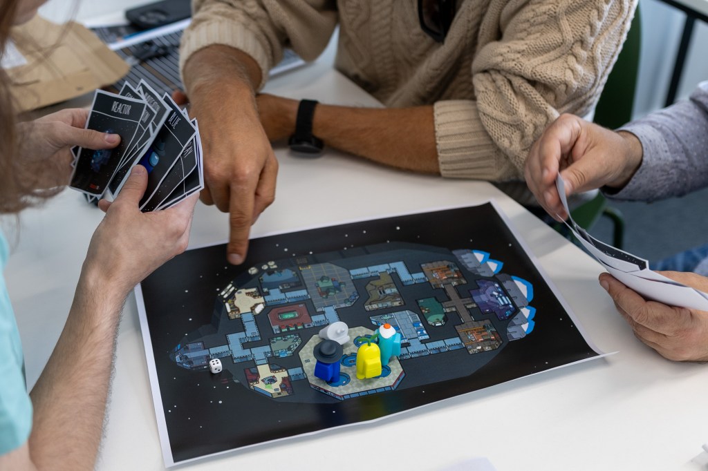 people playing board games