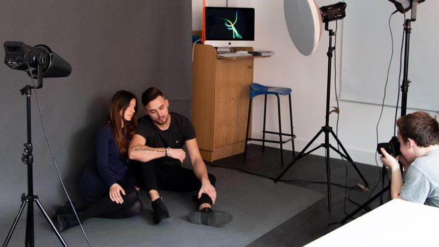 2 people at a photoshoot