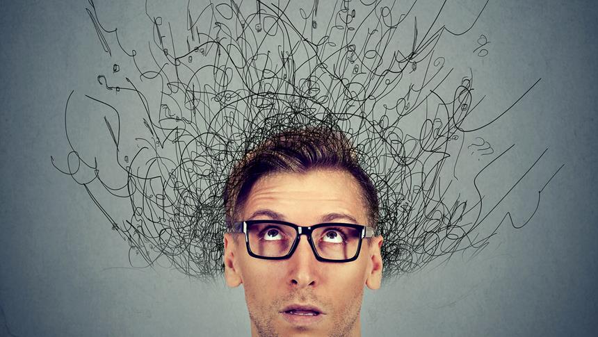 a person with doodles around their head