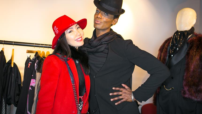 2 people backstage at a fashion show