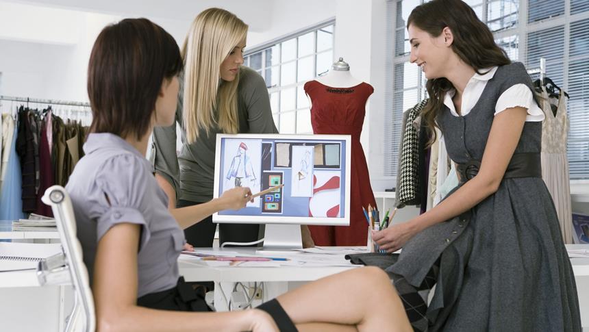 people looking at designs on the screen