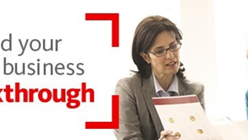 a women showing a file to someone else