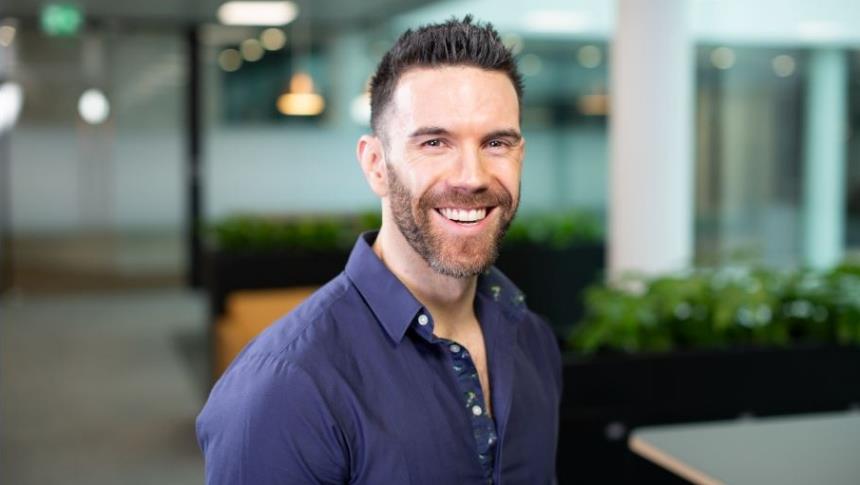 a man in a blue shirt