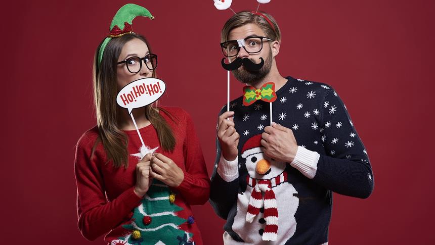 2 people dressed in christmas jumper